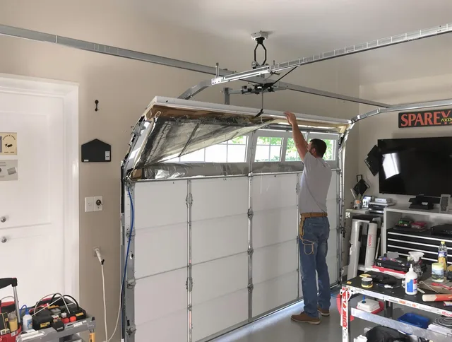 Garage door section replacement by Fountain Garage Door Repair in Fountain